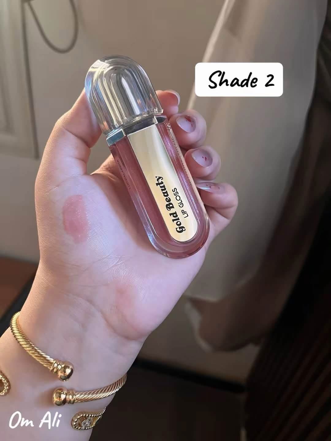 Gold beauty lip gloss